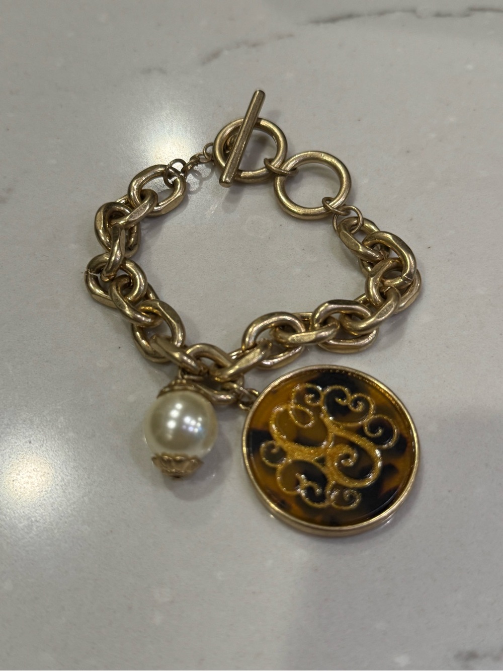Gold Chain Charm Bracelet with tortoiseshell “G” Enamel Disc and Pearl Accent
